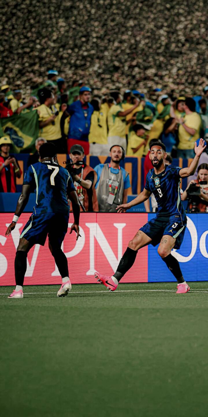 A soccer player in a blue kit celebrates a moment of triumph with raised hands and an open-mouthed expression in this vibrant 4K wallpaper. Vibrant pink boots stand out on the green pitch, making this dynamic football wallpaper an exciting choice for your iPhone. | football stadium celebration iphone soccer wallpaper players sport mobile 4k wallpaper hd wallpaper pink boots A soccer player in a blue kit celebrates a moment of triumph with raised hands and an open-mouthed expression in this vibrant 4K wallpaper. Vibrant pink boots stand out on the green pitch, making this dynamic football wallpaper an exciting choice for your iPhone.