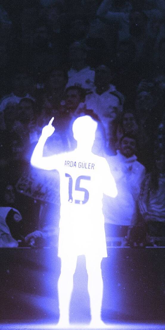 An ethereal purple glow vividly outlines Arda Guler's silhouette, his iconic number 15 shining bright as he raises a finger in triumph against a dark, blurred stadium crowd, creating a truly unique 4K wallpaper for your iPhone. | sports football purple neon iphone wallpaper silhouette mobile glowing 4k wallpaper hd wallpaper arda guler An ethereal purple glow vividly outlines Arda Guler's silhouette, his iconic number 15 shining bright as he raises a finger in triumph against a dark, blurred stadium crowd, creating a truly unique 4K wallpaper for your iPhone.