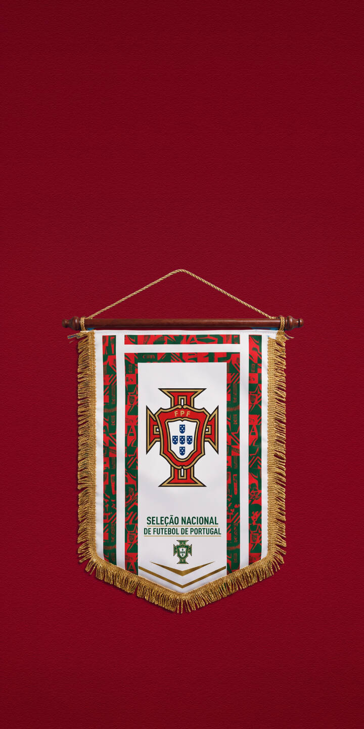 The vibrant red background highlights the iconic Portuguese football crest on this detailed vertical banner, featuring elegant gold fringe and the text 'Seleção Nacional de Futebol de Portugal'. This striking 4K wallpaper offers a premium display for your iPhone, making it the perfect wallpaper for any dedicated fan. | sports football crest iphone wallpaper portugal banner mobile 4k wallpaper hd wallpaper red background selecao The vibrant red background highlights the iconic Portuguese football crest on this detailed vertical banner, featuring elegant gold fringe and the text 'Seleção Nacional de Futebol de Portugal'. This striking 4K wallpaper offers a premium display for your iPhone, making it the perfect wallpaper for any dedicated fan.