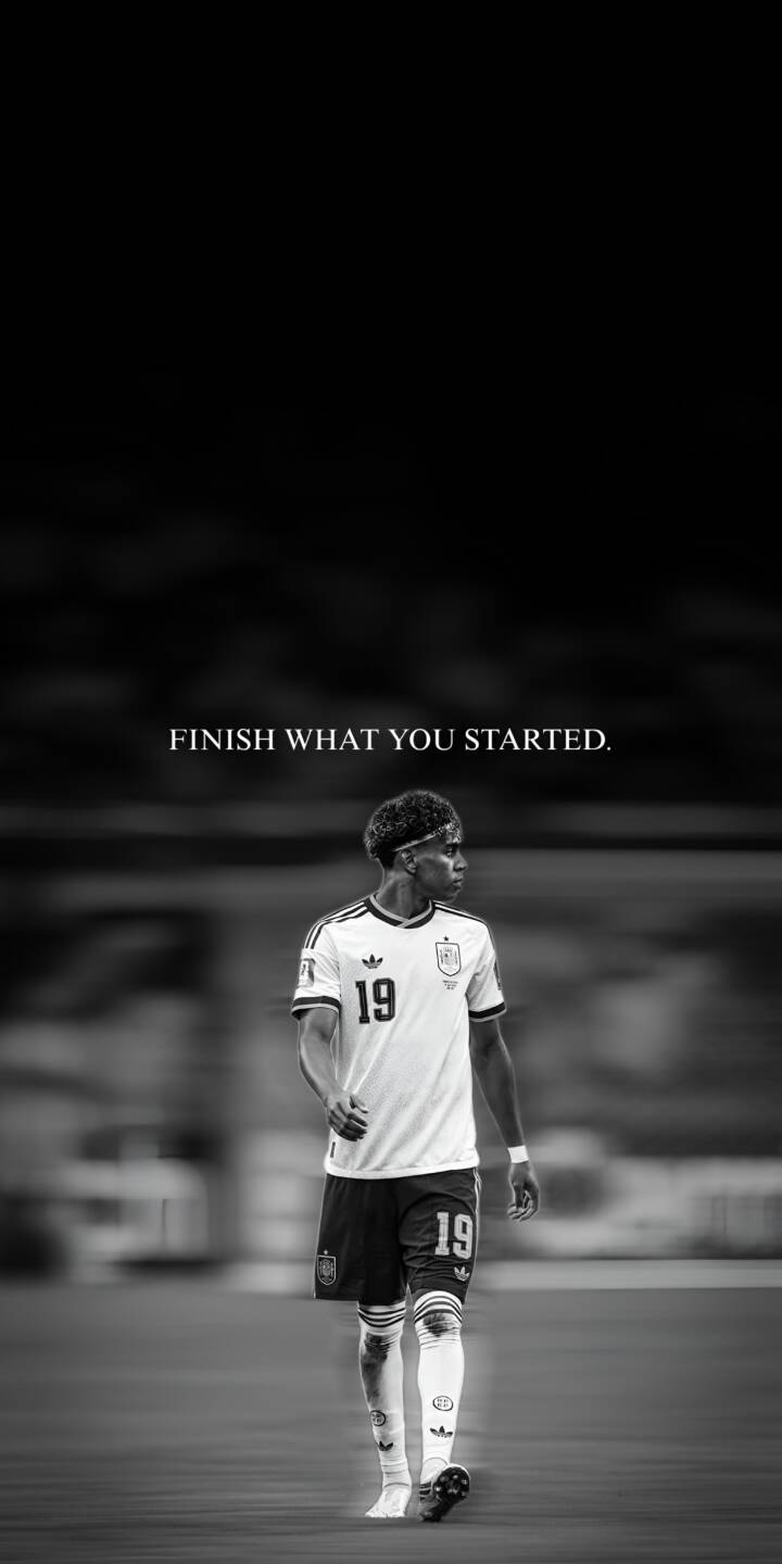The powerful black and white aesthetic accentuates Lamine Yamal walking with intent under the motivating quote "FINISH WHAT YOU STARTED" in this striking 4K wallpaper. This inspirational wallpaper, perfect for iPhone, captures the young footballer's determined spirit in his iconic number 19 jersey. | football motivational iphone soccer wallpaper black and white lamine yamal sport mobile 4k wallpaper hd wallpaper finish what you started The powerful black and white aesthetic accentuates Lamine Yamal walking with intent under the motivating quote "FINISH WHAT YOU STARTED" in this striking 4K wallpaper. This inspirational wallpaper, perfect for iPhone, captures the young footballer's determined spirit in his iconic number 19 jersey.