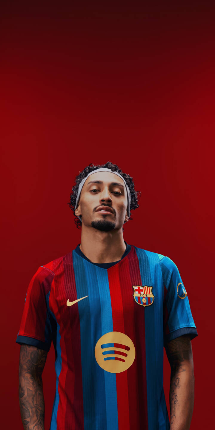 Against a vibrant solid red background, a confident FC Barcelona player in his iconic striped kit and headband gazes directly forward, creating a powerful 4K wallpaper. This stunning football wallpaper is perfectly optimized for iPhone, showcasing the details of his Spotify-sponsored jersey. | football aesthetic iphone soccer barcelona wallpaper fc barcelona mobile 4k wallpaper hd wallpaper red background sports jersey Against a vibrant solid red background, a confident FC Barcelona player in his iconic striped kit and headband gazes directly forward, creating a powerful 4K wallpaper. This stunning football wallpaper is perfectly optimized for iPhone, showcasing the details of his Spotify-sponsored jersey.