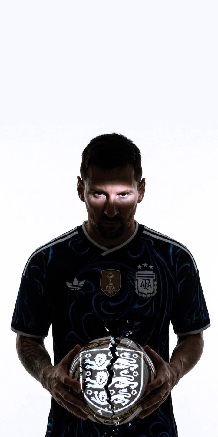 Lionel Messi's illuminated eyes gaze intensely as he holds a dramatic, split soccer ball displaying the England crest in this striking 4K wallpaper. This powerful visual makes for an exceptional wallpaper on your iPhone, especially for football fans. | football iphone messi argentina minimalist soccer wallpaper lionel messi mobile 4k wallpaper hd wallpaper epic Lionel Messi's illuminated eyes gaze intensely as he holds a dramatic, split soccer ball displaying the England crest in this striking 4K wallpaper. This powerful visual makes for an exceptional wallpaper on your iPhone, especially for football fans.