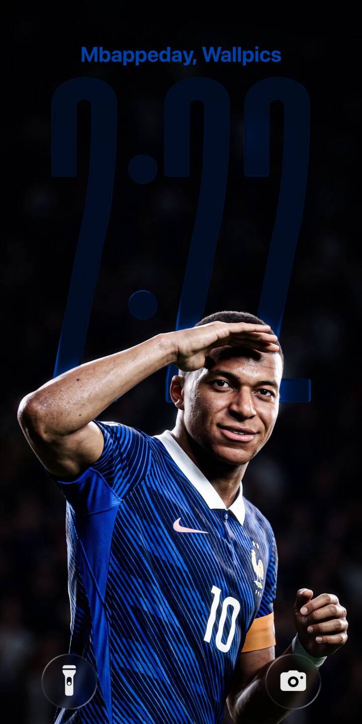 Kylian Mbappé strikes his iconic pose, shading his eyes from the light, in this striking 4K wallpaper featuring his blue France national team jersey and number 10, making it a dynamic wallpaper for any iPhone. | sports football athlete iphone france mbappe soccer wallpaper mobile 4k wallpaper hd wallpaper kylian mbappe Kylian Mbappé strikes his iconic pose, shading his eyes from the light, in this striking 4K wallpaper featuring his blue France national team jersey and number 10, making it a dynamic wallpaper for any iPhone.