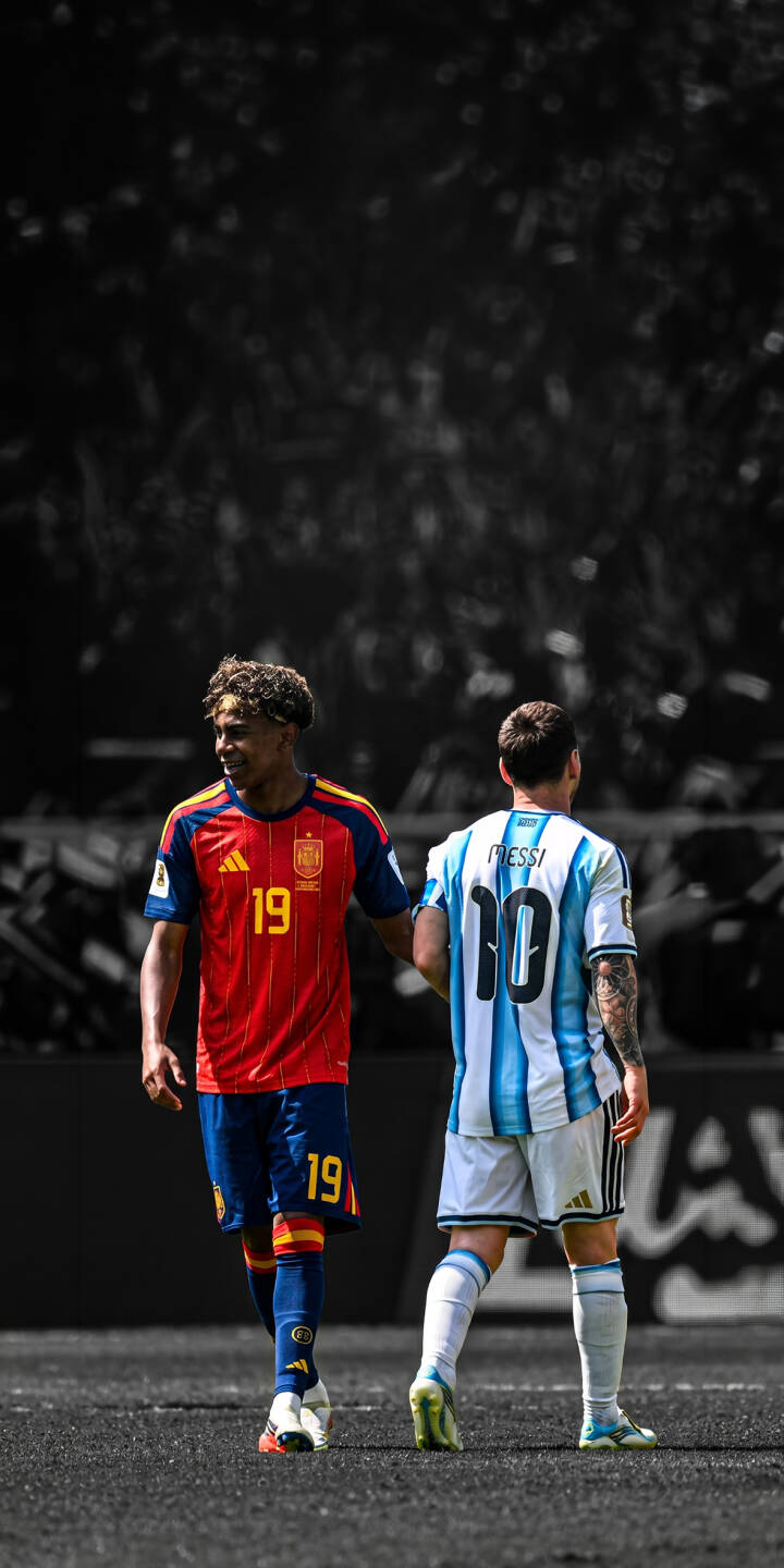 A moment of mutual respect is beautifully captured as Lionel Messi in his iconic Argentina kit and Gavi in his Spain jersey share the pitch, rendered in stunning 4K detail. This compelling football wallpaper, with its vibrant players against a desaturated background, makes an excellent iPhone wallpaper. | sports football iphone argentina soccer spain wallpaper lionel messi mobile 4k wallpaper hd wallpaper gavi A moment of mutual respect is beautifully captured as Lionel Messi in his iconic Argentina kit and Gavi in his Spain jersey share the pitch, rendered in stunning 4K detail. This compelling football wallpaper, with its vibrant players against a desaturated background, makes an excellent iPhone wallpaper.