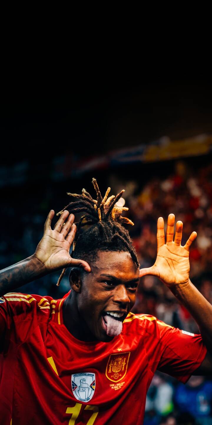 Nico Williams Jr. makes a hilarious goofy face, sticking out his tongue while framing his face with his hands, in this vibrant 4K wallpaper showcasing his playful energy. This dynamic celebration wallpaper is a must-have for any iPhone fan. | football athlete celebration iphone soccer wallpaper williams mobile funny face 4k wallpaper hd wallpaper dreadlocks spain player williams jr Nico Williams Jr. makes a hilarious goofy face, sticking out his tongue while framing his face with his hands, in this vibrant 4K wallpaper showcasing his playful energy. This dynamic celebration wallpaper is a must-have for any iPhone fan.
