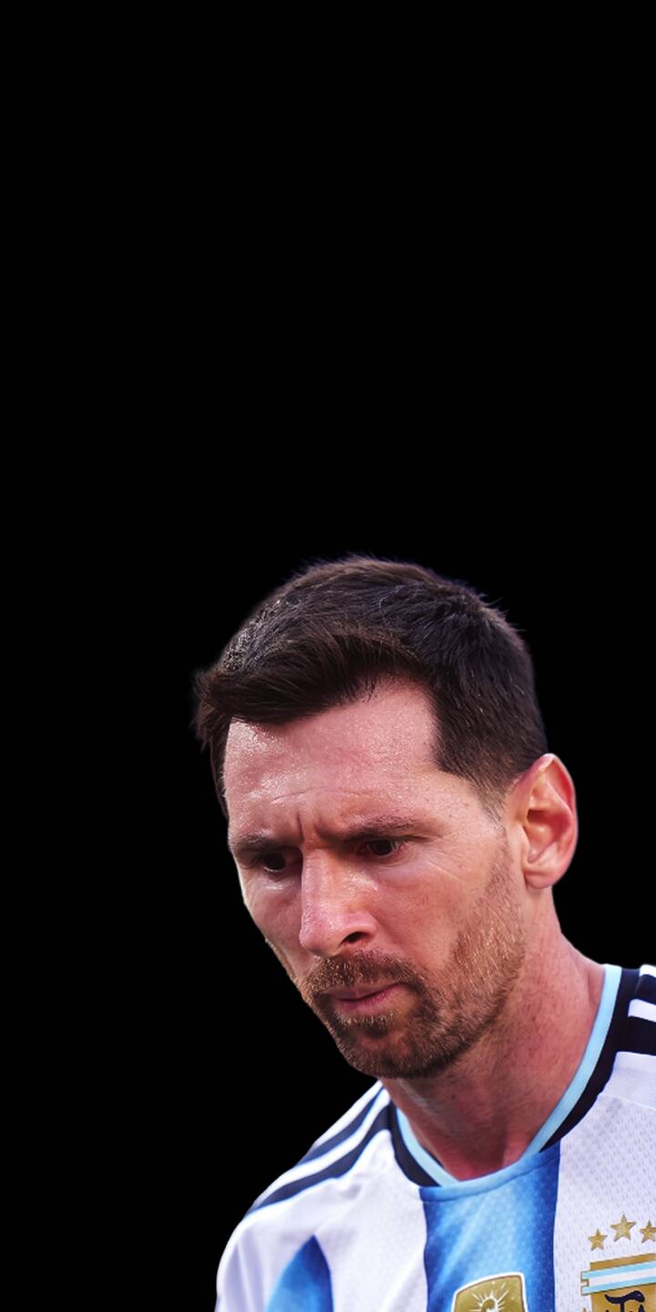 A somber or intense expression crosses Lionel Messi's face, highlighting the detail of his iconic blue-striped Argentina jersey in this captivating 4K wallpaper — an essential wallpaper for iPhone showcasing the legendary footballer. | football portrait athlete iphone messi argentina soccer wallpaper lionel messi mobile 4k wallpaper hd wallpaper A somber or intense expression crosses Lionel Messi's face, highlighting the detail of his iconic blue-striped Argentina jersey in this captivating 4K wallpaper — an essential wallpaper for iPhone showcasing the legendary footballer.