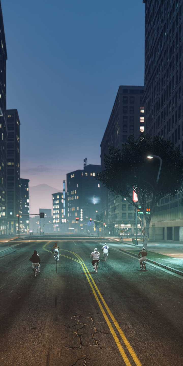 Under the serene blue twilight sky, a group of cyclists glides down a vibrant city street, passing towering illuminated buildings and reflecting the warm glow of streetlights. This dynamic urban 4K wallpaper captures the cool evening vibe, making it a perfect aesthetic wallpaper for your iPhone. | city urban night bicycle twilight iphone wallpaper mobile street 4k wallpaper hd wallpaper cycling Under the serene blue twilight sky, a group of cyclists glides down a vibrant city street, passing towering illuminated buildings and reflecting the warm glow of streetlights. This dynamic urban 4K wallpaper captures the cool evening vibe, making it a perfect aesthetic wallpaper for your iPhone.