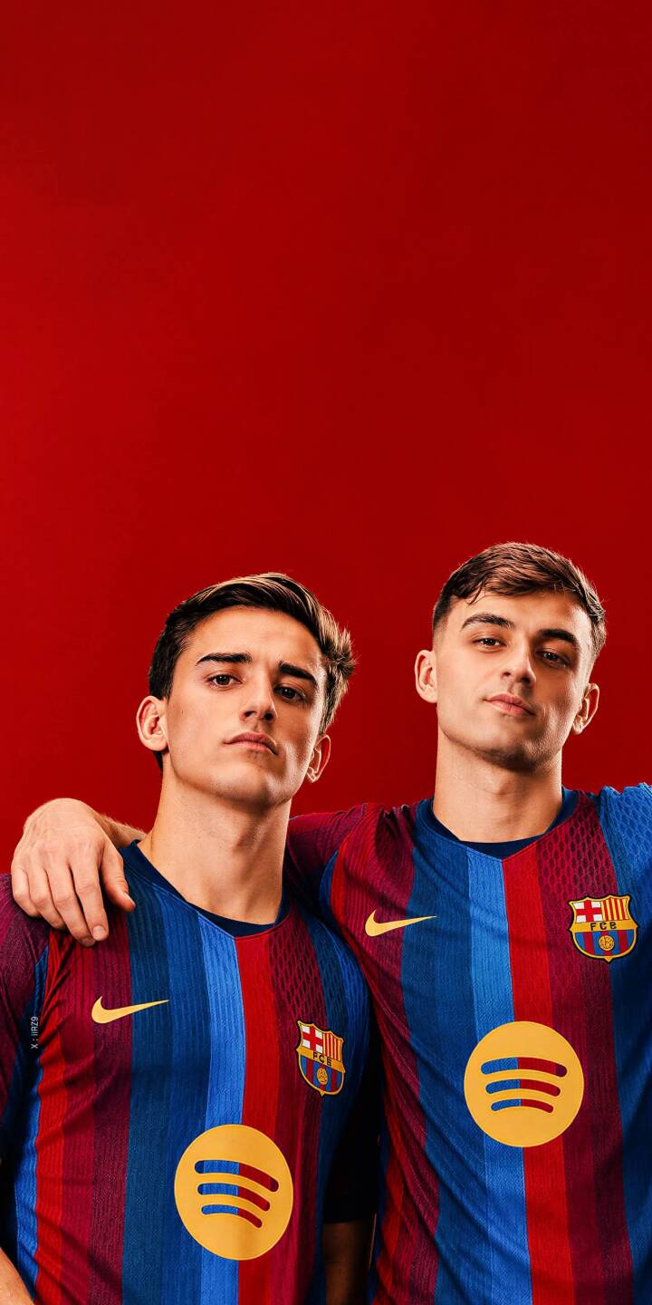 The vibrant red background brilliantly highlights Gavi and Pedri proudly wearing their classic blue and red striped FC Barcelona jerseys in this striking 4K wallpaper. Featuring the popular duo with Gavi's arm around Pedri, this dynamic wallpaper is a perfect fit for any iPhone. | sports football iphone wallpaper barca pedri fc barcelona mobile 4k wallpaper hd wallpaper red background gavi The vibrant red background brilliantly highlights Gavi and Pedri proudly wearing their classic blue and red striped FC Barcelona jerseys in this striking 4K wallpaper. Featuring the popular duo with Gavi's arm around Pedri, this dynamic wallpaper is a perfect fit for any iPhone.