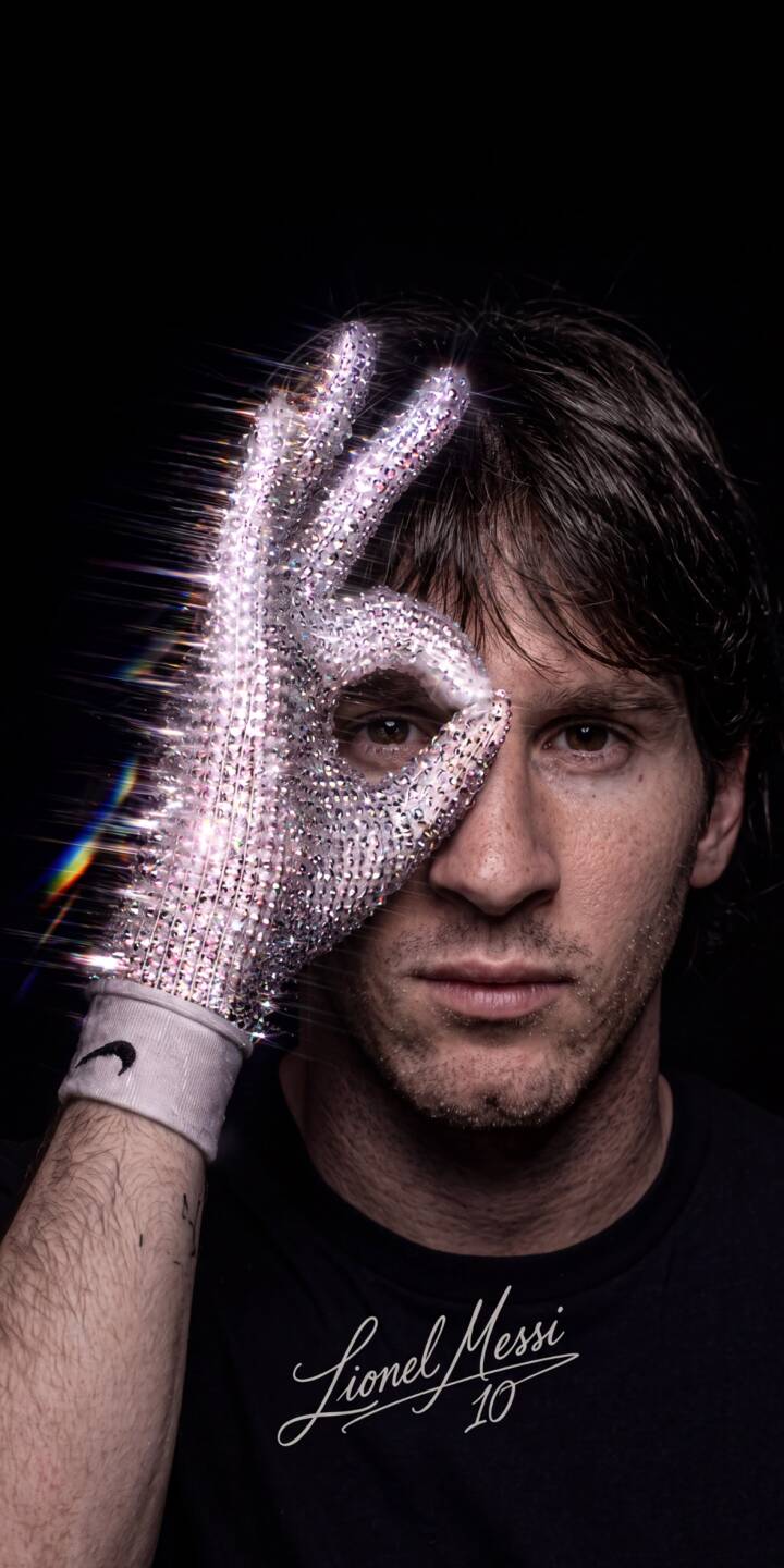 A dazzling, glitter-covered glove, featuring a prominent Nike swoosh, forms an 'ok' sign over Lionel Messi's eye in this captivating 4K wallpaper; it's the perfect dynamic wallpaper for iPhone users. | sports aesthetic iphone messi soccer wallpaper lionel messi mobile celebrity 4k wallpaper hd wallpaper glitter glove A dazzling, glitter-covered glove, featuring a prominent Nike swoosh, forms an 'ok' sign over Lionel Messi's eye in this captivating 4K wallpaper; it's the perfect dynamic wallpaper for iPhone users.