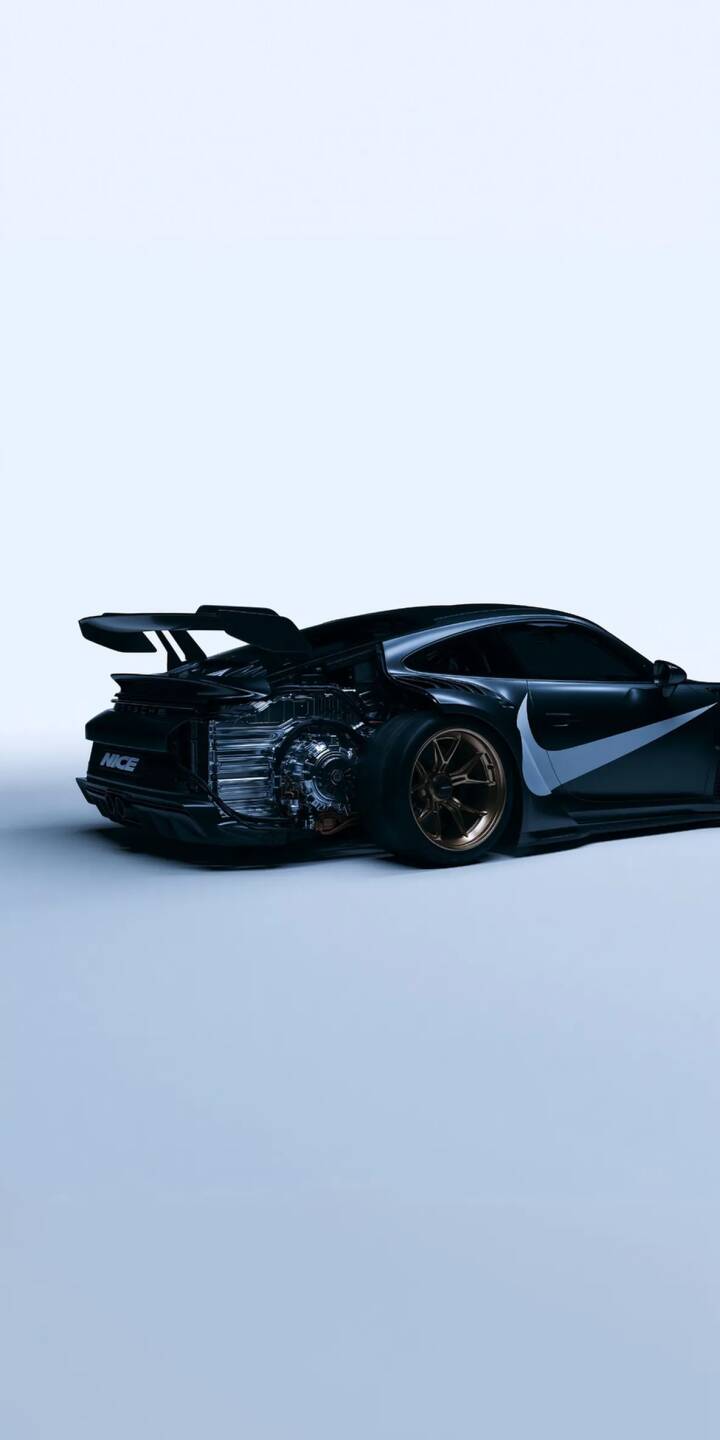 Strikingly visible through a transparent rear panel, the intricate engine mechanics of this dark, custom sports car are revealed. Adorned with a prominent white Nike swoosh and gleaming gold rims, this stunning 4K wallpaper is a must-have car wallpaper for iPhone enthusiasts. | car sports car nike iphone wallpaper futuristic mobile 4k wallpaper hd wallpaper automotive gold rims exposed engine Strikingly visible through a transparent rear panel, the intricate engine mechanics of this dark, custom sports car are revealed. Adorned with a prominent white Nike swoosh and gleaming gold rims, this stunning 4K wallpaper is a must-have car wallpaper for iPhone enthusiasts.