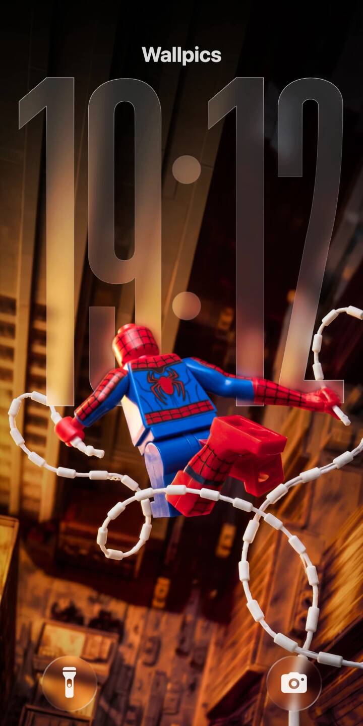 LEGO Spider-Man is caught mid-web-sling, iconic white web lines dynamically trailing behind him against a warmly lit city backdrop in this striking 4K wallpaper. This action-packed wallpaper, featuring the beloved minifigure hero, is a perfect mobile wallpaper for any iPhone, capturing a unique perspective of the friendly neighborhood hero. | superhero lego marvel spiderman iphone wallpaper mobile 4k wallpaper hd wallpaper webslinger spider-man minifigure LEGO Spider-Man is caught mid-web-sling, iconic white web lines dynamically trailing behind him against a warmly lit city backdrop in this striking 4K wallpaper. This action-packed wallpaper, featuring the beloved minifigure hero, is a perfect mobile wallpaper for any iPhone, capturing a unique perspective of the friendly neighborhood hero.