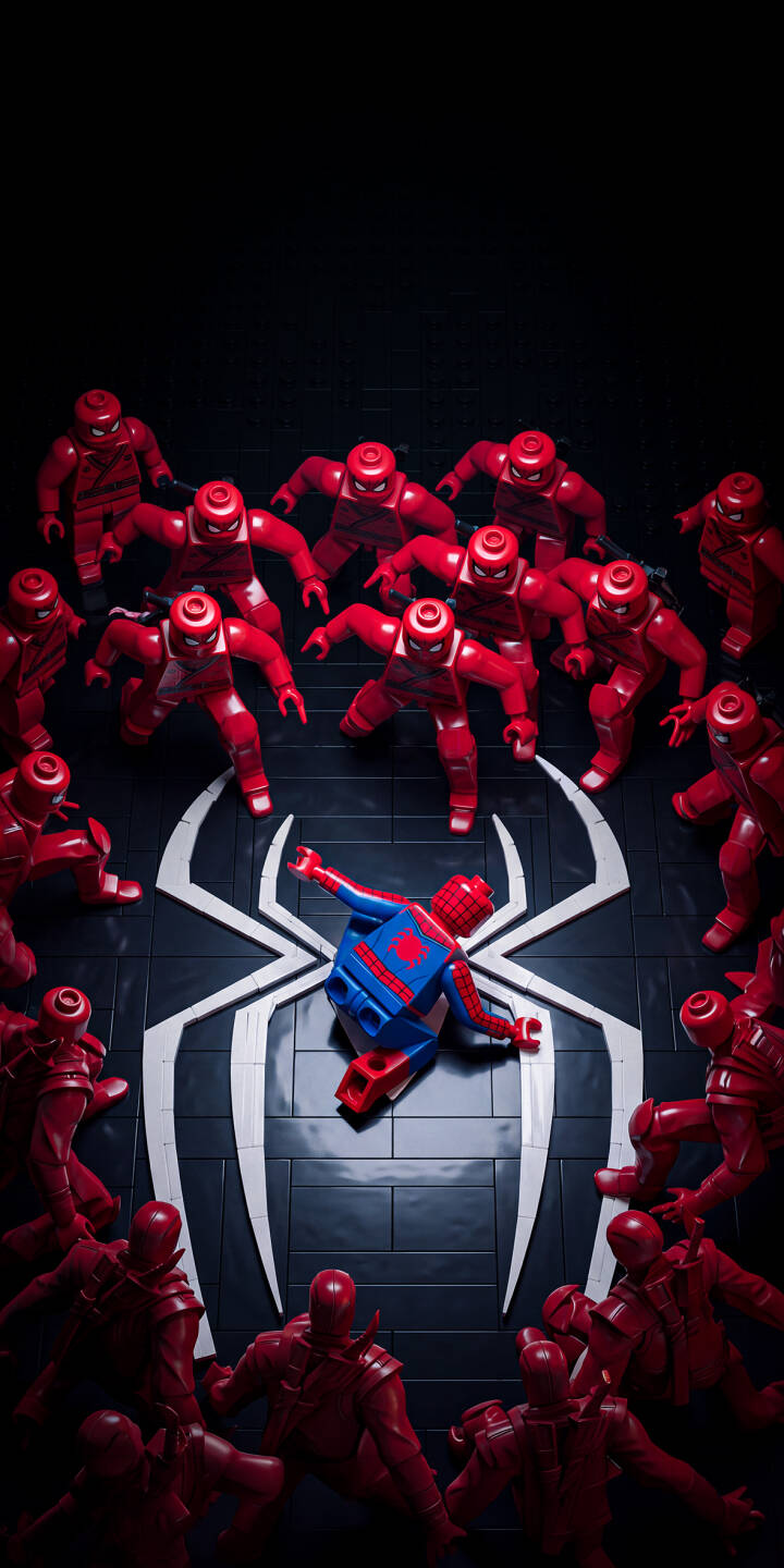 A heroic blue and red Lego Spider-Man lies splayed on a dramatic white spider logo, surrounded by a menacing army of red Lego figures in this striking 4K wallpaper. This dynamic scene makes for an impactful iPhone wallpaper for any fan. | red superhero lego marvel iphone wallpaper mobile 4k wallpaper hd wallpaper spider-man iconic diorama A heroic blue and red Lego Spider-Man lies splayed on a dramatic white spider logo, surrounded by a menacing army of red Lego figures in this striking 4K wallpaper. This dynamic scene makes for an impactful iPhone wallpaper for any fan.