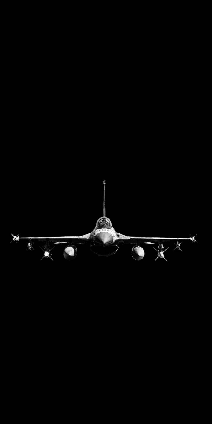 A sleek monochrome fighter jet, armed with visible missiles, stands poised against a stark black background in this powerful 4K wallpaper. This minimalist dark wallpaper provides an intense military aesthetic for your iPhone. | dark jet iphone fighter jet minimalist wallpaper mobile aircraft 4k wallpaper hd wallpaper monochrome military A sleek monochrome fighter jet, armed with visible missiles, stands poised against a stark black background in this powerful 4K wallpaper. This minimalist dark wallpaper provides an intense military aesthetic for your iPhone.