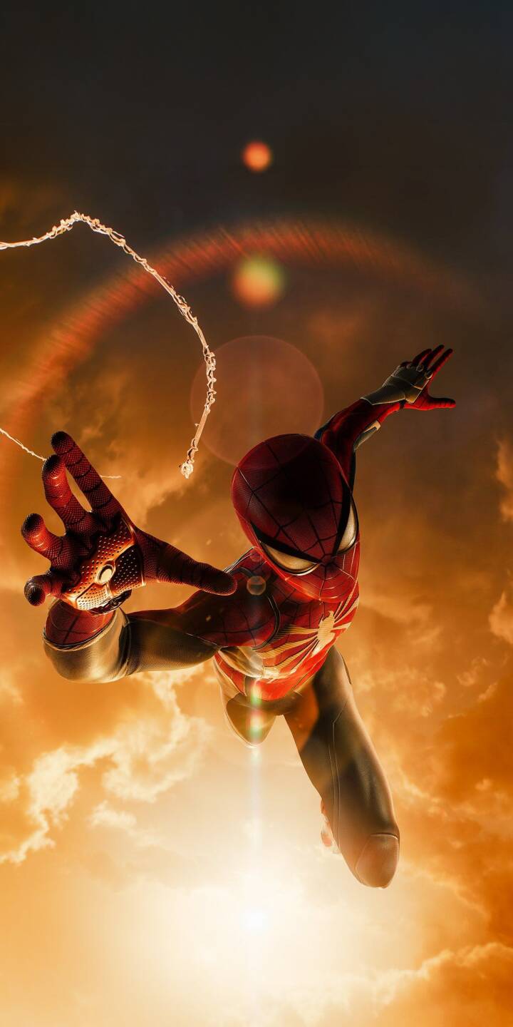 Golden sunlight strikingly illuminates the Advanced Suit Spider-Man as he dynamically slings a web across a vibrant orange and cloudy sky. This stunning 4K wallpaper is an essential iPhone wallpaper for any Marvel fan. | superhero marvel spiderman iphone wallpaper mobile golden hour 4k wallpaper hd wallpaper spider-man advanced suit Golden sunlight strikingly illuminates the Advanced Suit Spider-Man as he dynamically slings a web across a vibrant orange and cloudy sky. This stunning 4K wallpaper is an essential iPhone wallpaper for any Marvel fan.