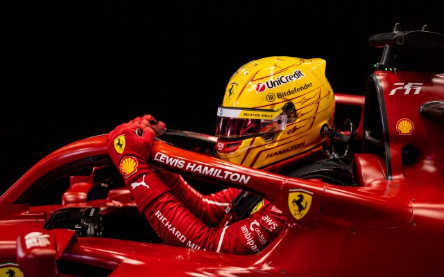 Lewis Hamilton's striking yellow helmet and vivid red Ferrari race suit dominate this captivating 4K wallpaper, showcasing him gripping the steering wheel with intense focus. This dynamic wallpaper for MacOS and MacBook devices beautifully highlights the legendary F1 driver within his iconic race car. | sports ferrari wallpaper f1 racing macos lewis hamilton formula 1 4k wallpaper hd wallpaper macbook imac Lewis Hamilton's striking yellow helmet and vivid red Ferrari race suit dominate this captivating 4K wallpaper, showcasing him gripping the steering wheel with intense focus. This dynamic wallpaper for MacOS and MacBook devices beautifully highlights the legendary F1 driver within his iconic race car.