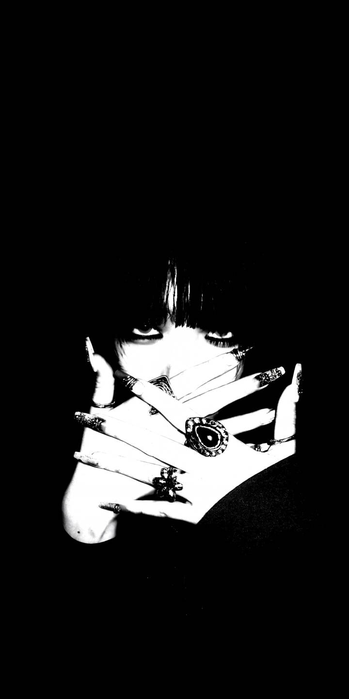 Mesmerizing, wide-open eyes peer through intricately ringed hands, dominating this high-contrast black and white 4K wallpaper. This striking monochrome wallpaper, featuring elegant hands and elaborate jewelry, is a perfect dramatic choice for iPhone. | gothic iphone rings wallpaper black and white mobile 4k wallpaper hd wallpaper jewelry dark aesthetic monochrome intense eyes Mesmerizing, wide-open eyes peer through intricately ringed hands, dominating this high-contrast black and white 4K wallpaper. This striking monochrome wallpaper, featuring elegant hands and elaborate jewelry, is a perfect dramatic choice for iPhone.