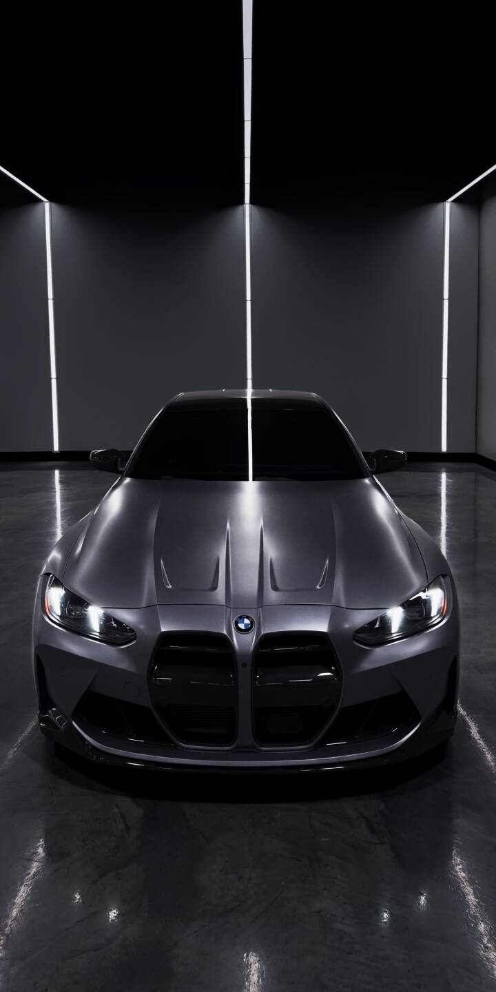 The deep matte finish of the BMW M4 G82 gleams under striking vertical strip lights, creating a sophisticated mood in this captivating 4K wallpaper. This dynamic automobile wallpaper, featuring illuminated LED headlights and a reflective dark floor, is a perfect choice for your iPhone. | sports car iphone bmw wallpaper bmw m4 mobile luxury car 4k wallpaper hd wallpaper automotive dark aesthetic matte finish The deep matte finish of the BMW M4 G82 gleams under striking vertical strip lights, creating a sophisticated mood in this captivating 4K wallpaper. This dynamic automobile wallpaper, featuring illuminated LED headlights and a reflective dark floor, is a perfect choice for your iPhone.