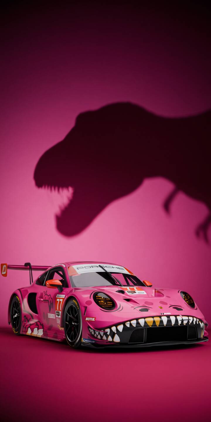 A vibrant pink Porsche race car, modified with sharp dinosaur teeth on its front bumper, casts a towering T-Rex shadow against a vivid magenta background in this striking 4K wallpaper. This unique automotive wallpaper is a fantastic choice for any iPhone user looking for a bold and playful look. | aesthetic race car iphone porsche dinosaur wallpaper mobile pink car 4k wallpaper hd wallpaper automotive t-rex shadow A vibrant pink Porsche race car, modified with sharp dinosaur teeth on its front bumper, casts a towering T-Rex shadow against a vivid magenta background in this striking 4K wallpaper. This unique automotive wallpaper is a fantastic choice for any iPhone user looking for a bold and playful look.