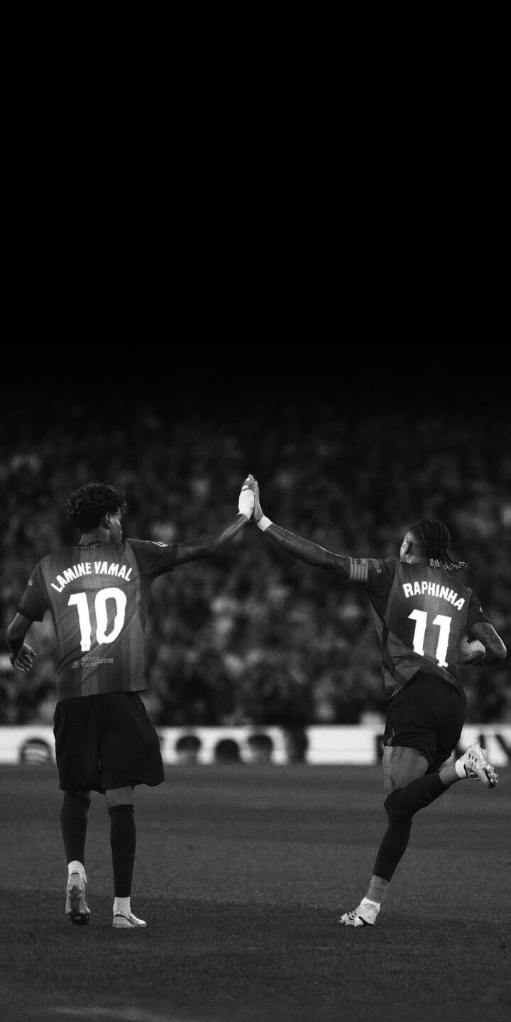 Lamine Yamal and Raphinha share a powerful high-five on the football pitch, rendered in a classic black and white style for this stunning 4K wallpaper. This captivating wallpaper is a perfect iPhone background for fans celebrating these two dynamic players. | sports football celebration iphone soccer wallpaper raphinha black and white lamine yamal mobile 4k wallpaper hd wallpaper Lamine Yamal and Raphinha share a powerful high-five on the football pitch, rendered in a classic black and white style for this stunning 4K wallpaper. This captivating wallpaper is a perfect iPhone background for fans celebrating these two dynamic players.