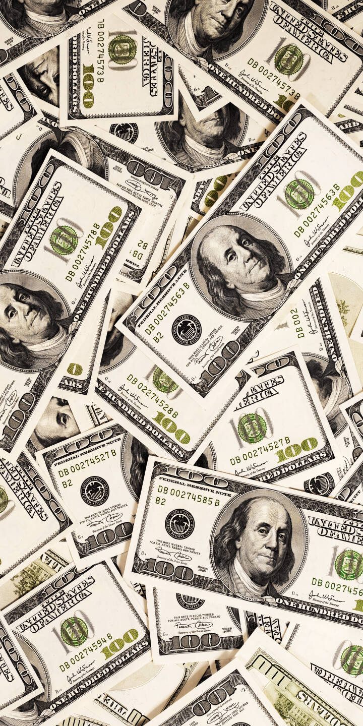 A vibrant array of crisp hundred-dollar bills, featuring Benjamin Franklin's detailed portrait and green numerical accents, blankets the screen in this striking 4K wallpaper. This rich money wallpaper is perfect for personalizing your iPhone. | cash money iphone wallpaper dollars mobile 4k wallpaper hd wallpaper finance wealth benjamin franklin hundred dollar bill A vibrant array of crisp hundred-dollar bills, featuring Benjamin Franklin's detailed portrait and green numerical accents, blankets the screen in this striking 4K wallpaper. This rich money wallpaper is perfect for personalizing your iPhone.