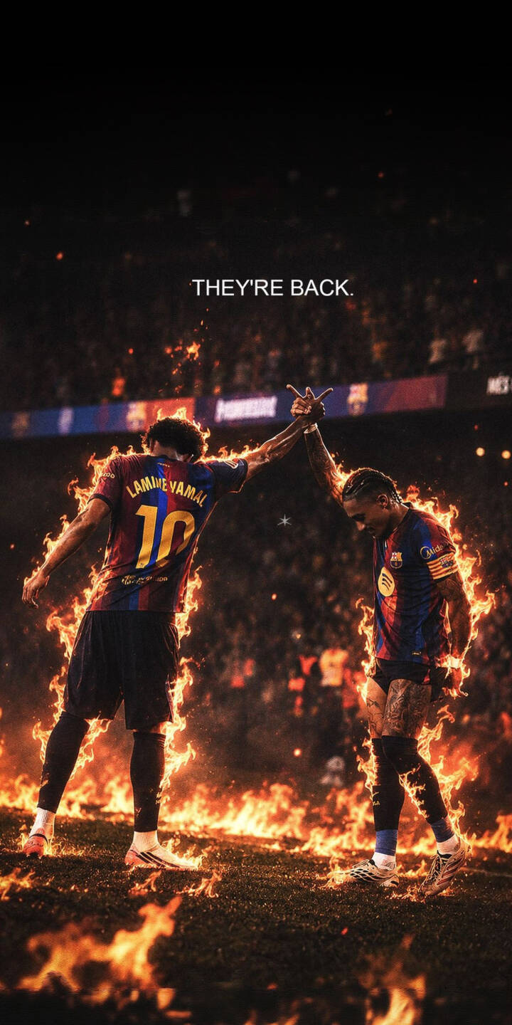 Vivid orange flames spectacularly engulf Lamine Yamal and his teammate as they high-five, creating an epic 4K football wallpaper perfect for iPhone. This intense dynamic wallpaper captures the exciting return of these Barcelona players, set against a dark stadium backdrop. | football stadium fire iphone soccer barcelona wallpaper lamine yamal mobile 4k wallpaper hd wallpaper epic Vivid orange flames spectacularly engulf Lamine Yamal and his teammate as they high-five, creating an epic 4K football wallpaper perfect for iPhone. This intense dynamic wallpaper captures the exciting return of these Barcelona players, set against a dark stadium backdrop.