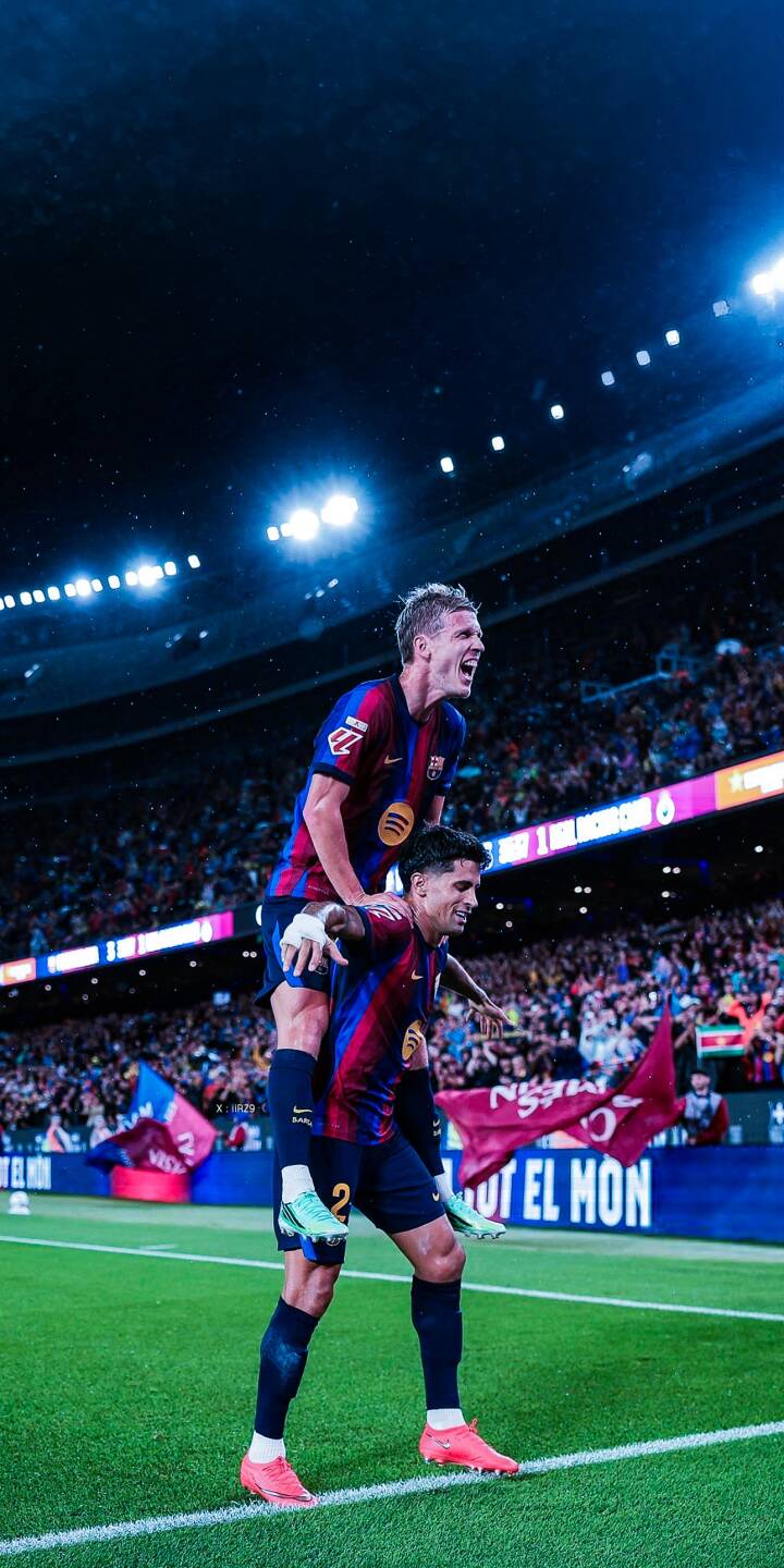 Vibrant stadium lights illuminate two jubilant FC Barcelona players celebrating a victory with a playful piggyback ride on the bright green pitch. This dynamic 4K football wallpaper perfectly captures the raw emotion of the game, creating an epic wallpaper for your iPhone. | football stadium night celebration iphone soccer dynamic wallpaper fc barcelona mobile 4k wallpaper hd wallpaper Vibrant stadium lights illuminate two jubilant FC Barcelona players celebrating a victory with a playful piggyback ride on the bright green pitch. This dynamic 4K football wallpaper perfectly captures the raw emotion of the game, creating an epic wallpaper for your iPhone.