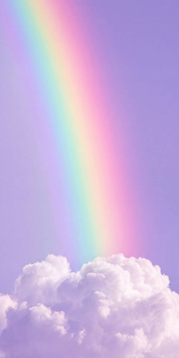 A gentle pastel rainbow arcs gracefully across a soft lavender sky in this ethereal 4K wallpaper, meeting fluffy white clouds at the horizon — an enchanting wallpaper perfect for iPhone screens. | aesthetic sky purple rainbow iphone clouds wallpaper pastel mobile 4k wallpaper hd wallpaper A gentle pastel rainbow arcs gracefully across a soft lavender sky in this ethereal 4K wallpaper, meeting fluffy white clouds at the horizon — an enchanting wallpaper perfect for iPhone screens.