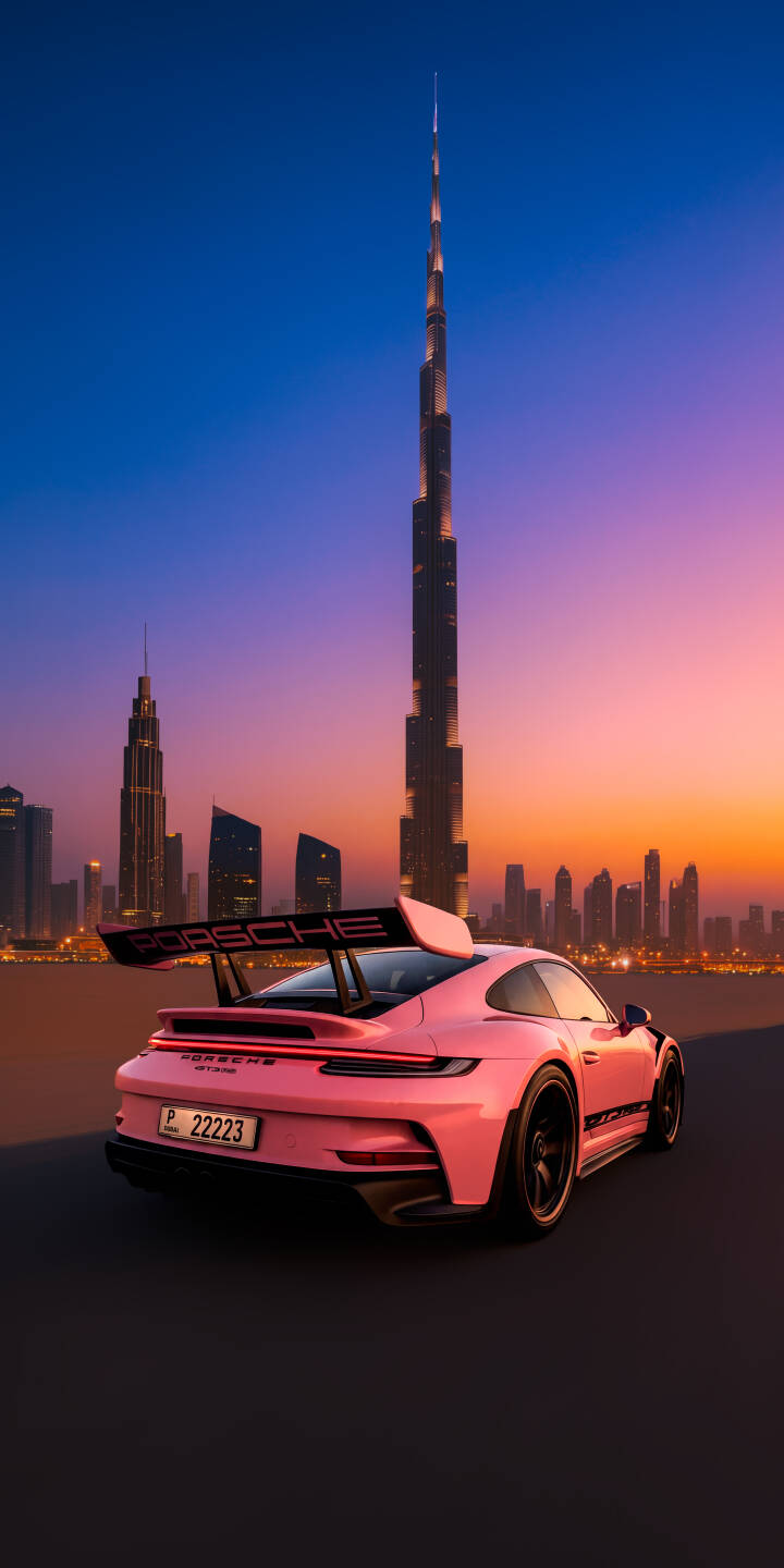 The vibrant pink Porsche GT3 with its distinctive rear wing gleams against the breathtaking sunset backdrop of the Dubai skyline, prominently featuring the magnificent Burj Khalifa in this stunning 4K wallpaper. This dynamic urban landscape provides an exquisite wallpaper for iPhone users. | sunset iphone porsche wallpaper mobile luxury car pink car 4k wallpaper hd wallpaper porsche gt3 dubai burj khalifa The vibrant pink Porsche GT3 with its distinctive rear wing gleams against the breathtaking sunset backdrop of the Dubai skyline, prominently featuring the magnificent Burj Khalifa in this stunning 4K wallpaper. This dynamic urban landscape provides an exquisite wallpaper for iPhone users.