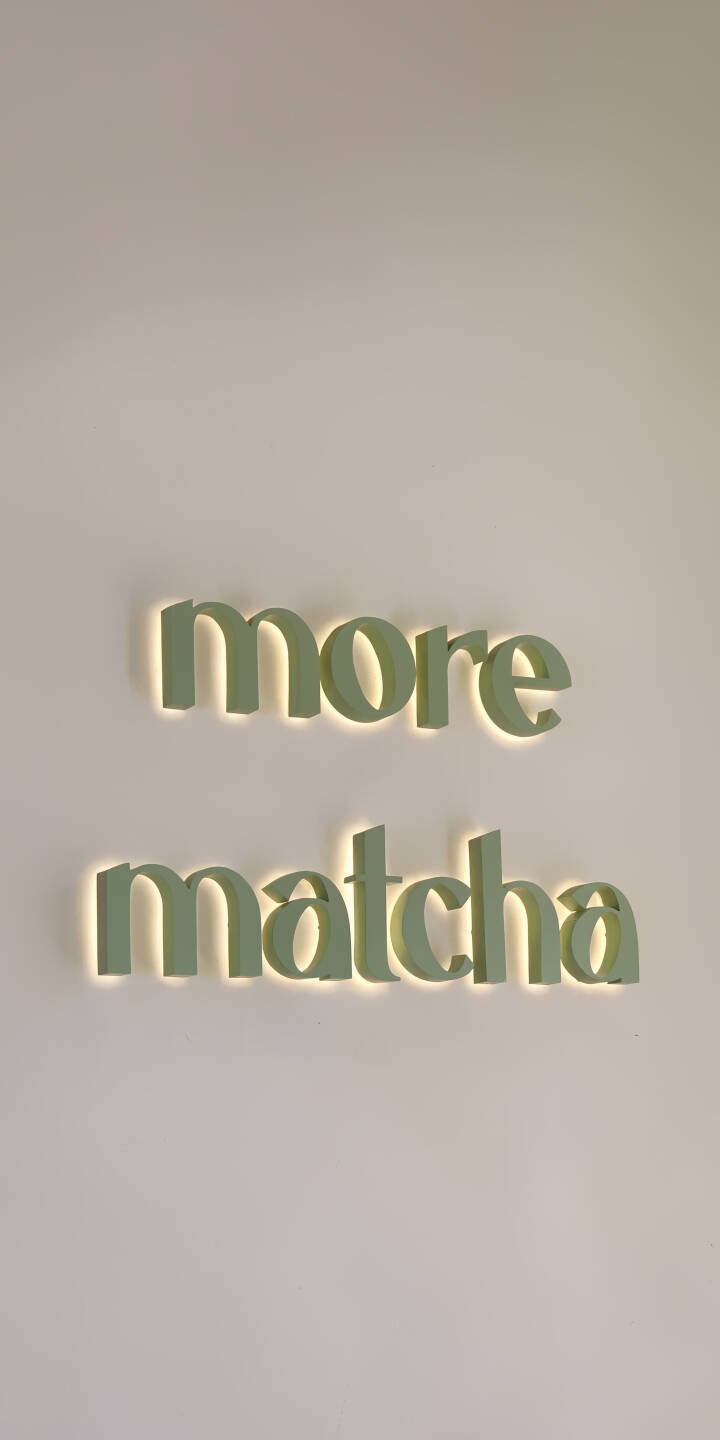 Soft backlighting illuminates the pale green "more matcha" sign against a clean white wall in this serene 4K wallpaper, making it a perfect aesthetic wallpaper for your iPhone. | aesthetic sign text neon iphone minimalist wallpaper mobile matcha 4k wallpaper hd wallpaper more matcha Soft backlighting illuminates the pale green "more matcha" sign against a clean white wall in this serene 4K wallpaper, making it a perfect aesthetic wallpaper for your iPhone.