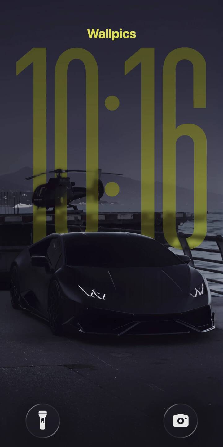 Sleek black Lamborghini headlights cut through the deep twilight, contrasting with the dark helicopter waiting on its helipad in this luxurious 4K wallpaper. This stunning night scene is a perfect wallpaper for iPhone users seeking a high-performance aesthetic. | aesthetic dark night iphone lamborghini supercar wallpaper black car mobile helicopter 4k wallpaper hd wallpaper Sleek black Lamborghini headlights cut through the deep twilight, contrasting with the dark helicopter waiting on its helipad in this luxurious 4K wallpaper. This stunning night scene is a perfect wallpaper for iPhone users seeking a high-performance aesthetic.