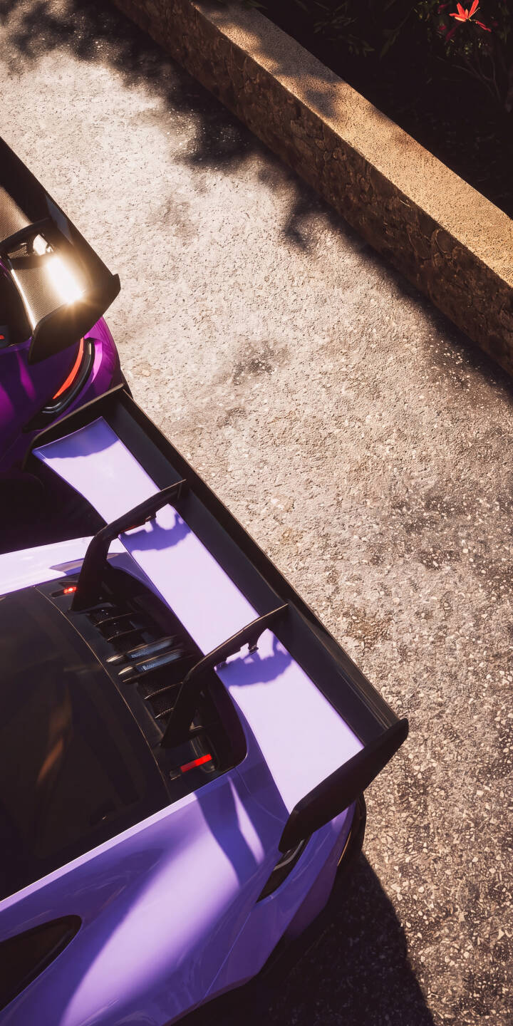 Its prominent dual-plane rear spoiler commands attention on this vibrant purple sports car, captured from a striking overhead angle in crisp 4K resolution; this is an essential wallpaper for any iPhone owner who appreciates automotive elegance. | aesthetic sports car vehicle iphone supercar wallpaper mobile purple car 4k wallpaper hd wallpaper automotive car spoiler Its prominent dual-plane rear spoiler commands attention on this vibrant purple sports car, captured from a striking overhead angle in crisp 4K resolution; this is an essential wallpaper for any iPhone owner who appreciates automotive elegance.