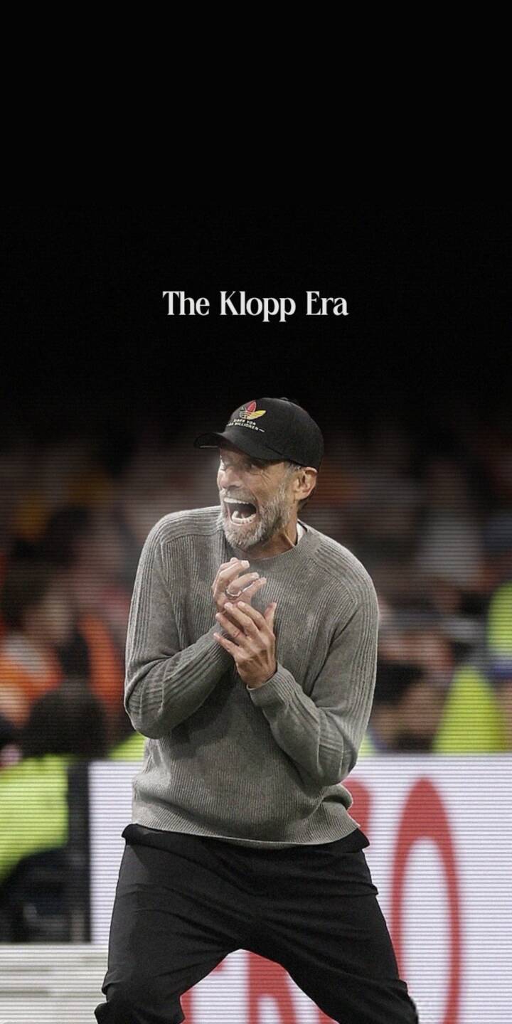 Jürgen Klopp's electrifying passion bursts forth with an open-mouthed shout and clasped hands beneath 'The Klopp Era' text in this striking 4K wallpaper. This dynamic wallpaper is a must-have for iPhone users who admire the legendary coach's energy. | sports iphone wallpaper liverpool mobile 4k wallpaper hd wallpaper epic passionate football coach jurgen klopp klopp Jürgen Klopp's electrifying passion bursts forth with an open-mouthed shout and clasped hands beneath 'The Klopp Era' text in this striking 4K wallpaper. This dynamic wallpaper is a must-have for iPhone users who admire the legendary coach's energy.