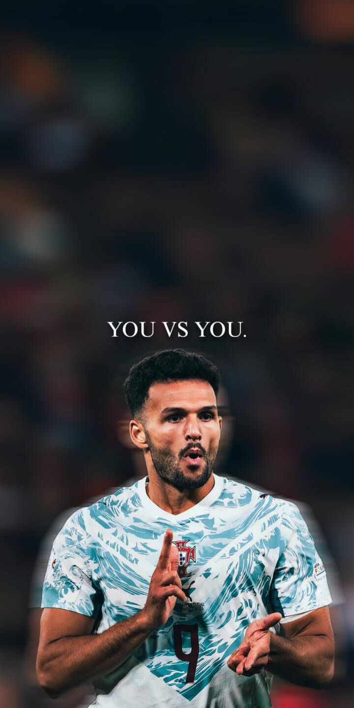 The inspiring 'YOU VS YOU' motto hovers above Gonçalo Ramos, captured mid-gesture in his Portugal jersey, creating a powerful 4K wallpaper for iPhone. This motivational wallpaper perfectly blends competitive spirit with a focus on personal challenge. | football athlete motivational iphone soccer wallpaper portugal mobile 4k wallpaper hd wallpaper ramos goncalo ramos The inspiring 'YOU VS YOU' motto hovers above Gonçalo Ramos, captured mid-gesture in his Portugal jersey, creating a powerful 4K wallpaper for iPhone. This motivational wallpaper perfectly blends competitive spirit with a focus on personal challenge.