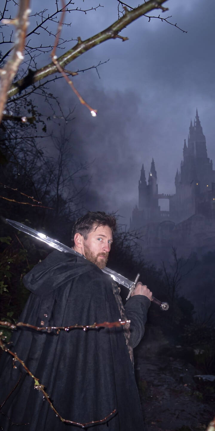 Gleaming in the low light, a cloaked and bearded warrior in this epic 4K wallpaper surveys a misty, ominous castle landscape, his large sword resting over his shoulder. This dramatic fantasy wallpaper is an ideal choice for any iPhone, capturing a dark medieval atmosphere perfect for your mobile device. | sword warrior dark castle knight iphone fantasy wallpaper mobile 4k wallpaper hd wallpaper mysterious Gleaming in the low light, a cloaked and bearded warrior in this epic 4K wallpaper surveys a misty, ominous castle landscape, his large sword resting over his shoulder. This dramatic fantasy wallpaper is an ideal choice for any iPhone, capturing a dark medieval atmosphere perfect for your mobile device.