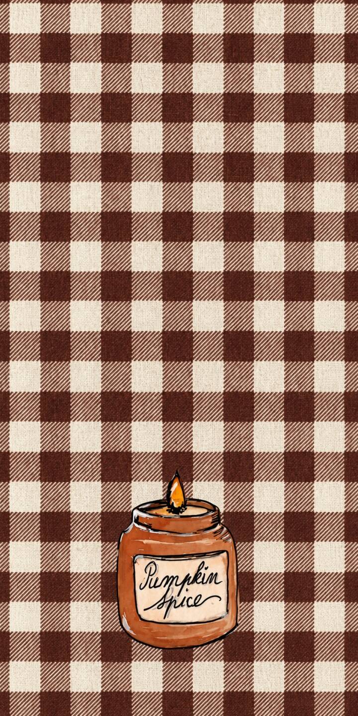 A warm, hand-drawn 'Pumpkin Spice' candle, complete with a flickering flame, sits against a classic brown and cream plaid pattern in this inviting 4K wallpaper. This charming wallpaper is perfect for personalizing your iPhone with cozy autumnal vibes. | candle plaid fall iphone autumn cozy wallpaper mobile 4k wallpaper hd wallpaper hand drawn pumpkin spice A warm, hand-drawn 'Pumpkin Spice' candle, complete with a flickering flame, sits against a classic brown and cream plaid pattern in this inviting 4K wallpaper. This charming wallpaper is perfect for personalizing your iPhone with cozy autumnal vibes.