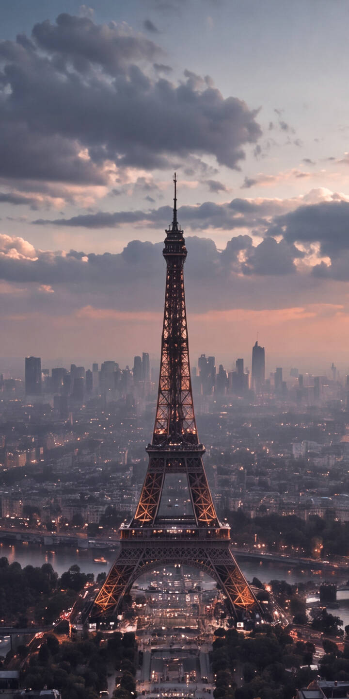 Golden lights shimmer brilliantly across the iconic Eiffel Tower, perfectly framed against a breathtaking twilight sky with soft purples and greys, creating a serene 4K wallpaper that captures the essence of Paris — a must-have wallpaper for iPhone users. | aesthetic twilight landmark iphone paris france wallpaper mobile 4k wallpaper hd wallpaper cityscape eiffel tower Golden lights shimmer brilliantly across the iconic Eiffel Tower, perfectly framed against a breathtaking twilight sky with soft purples and greys, creating a serene 4K wallpaper that captures the essence of Paris — a must-have wallpaper for iPhone users.