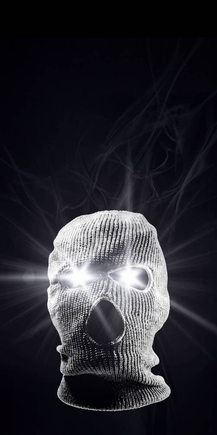 Intensely glowing eyes radiate from a textured white balaclava in this striking 4K wallpaper. Subtle wisps of smoke trail behind the enigmatic ski mask, creating a cool and mysterious iPhone wallpaper. | dark mask iphone wallpaper hacker mobile 4k wallpaper hd wallpaper ski mask glowing eyes mysterious balaclava Intensely glowing eyes radiate from a textured white balaclava in this striking 4K wallpaper. Subtle wisps of smoke trail behind the enigmatic ski mask, creating a cool and mysterious iPhone wallpaper.