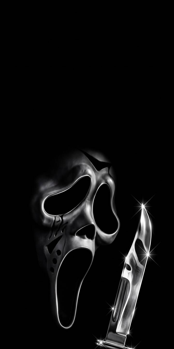 The iconic Ghostface mask emerges from the darkness, accompanied by a razor-sharp knife glinting with menacing light in this chilling 4K wallpaper. This terrifying wallpaper is perfect for any horror fan looking for a new iPhone background. | dark knife mask iphone minimalist wallpaper horror scream mobile ghostface 4k wallpaper hd wallpaper The iconic Ghostface mask emerges from the darkness, accompanied by a razor-sharp knife glinting with menacing light in this chilling 4K wallpaper. This terrifying wallpaper is perfect for any horror fan looking for a new iPhone background.