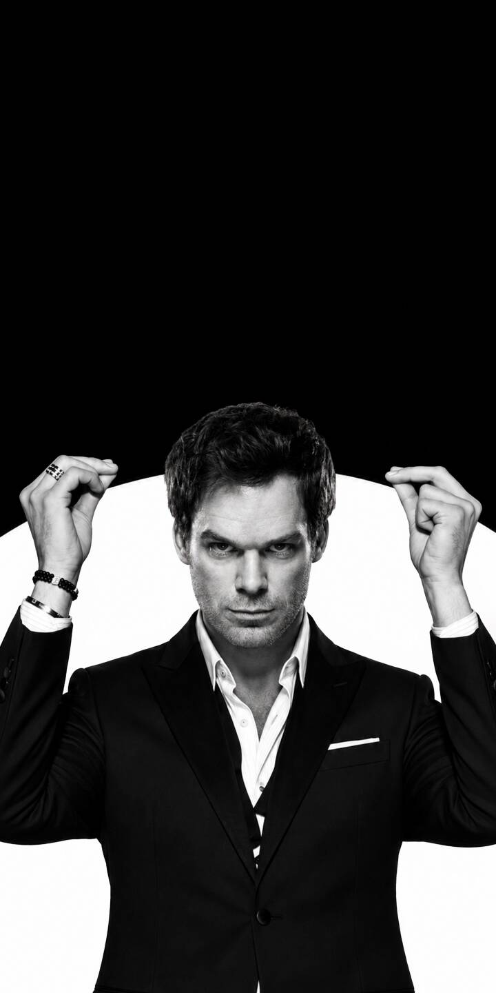 Michael C. Hall as Dexter Morgan captures a menacing intensity in this stark black and white 4K wallpaper, featuring his hands raised in a symbolic pose against a high-contrast background. This compelling image is an ideal dark aesthetic wallpaper for your iPhone. | suit iphone dexter wallpaper black and white dexter morgan mobile 4k wallpaper hd wallpaper michael c hall dark aesthetic intense Michael C. Hall as Dexter Morgan captures a menacing intensity in this stark black and white 4K wallpaper, featuring his hands raised in a symbolic pose against a high-contrast background. This compelling image is an ideal dark aesthetic wallpaper for your iPhone.