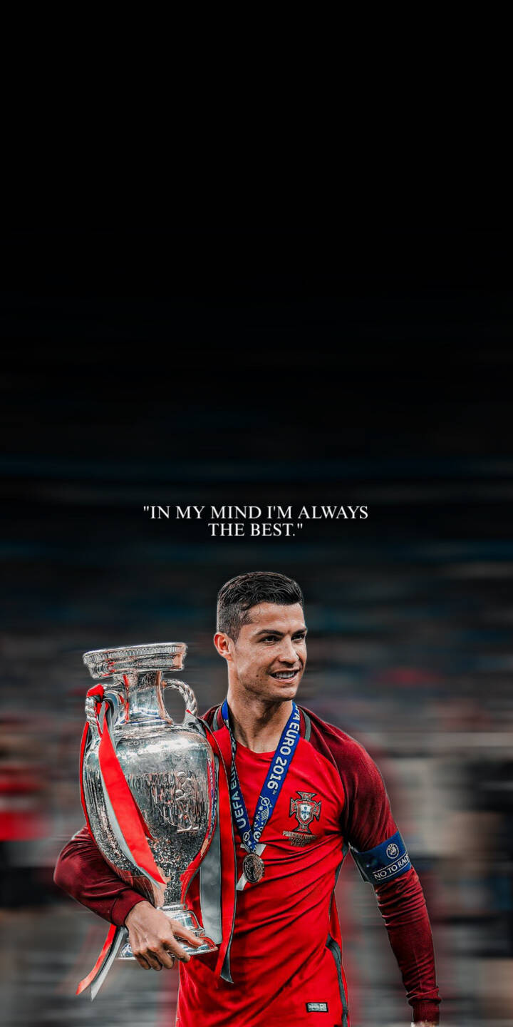 Cristiano Ronaldo's triumphant smile radiates pure joy as he proudly lifts the iconic Euro 2016 trophy, donning his red Portugal jersey in this inspiring 4K wallpaper. Embellished with his powerful quote, 'IN MY MIND I'M ALWAYS THE BEST.,' this motivational wallpaper is a must-have for iPhone users. | football iphone ronaldo soccer wallpaper cr7 cristiano ronaldo champion mobile 4k wallpaper hd wallpaper inspirational Cristiano Ronaldo's triumphant smile radiates pure joy as he proudly lifts the iconic Euro 2016 trophy, donning his red Portugal jersey in this inspiring 4K wallpaper. Embellished with his powerful quote, 'IN MY MIND I'M ALWAYS THE BEST.,' this motivational wallpaper is a must-have for iPhone users.