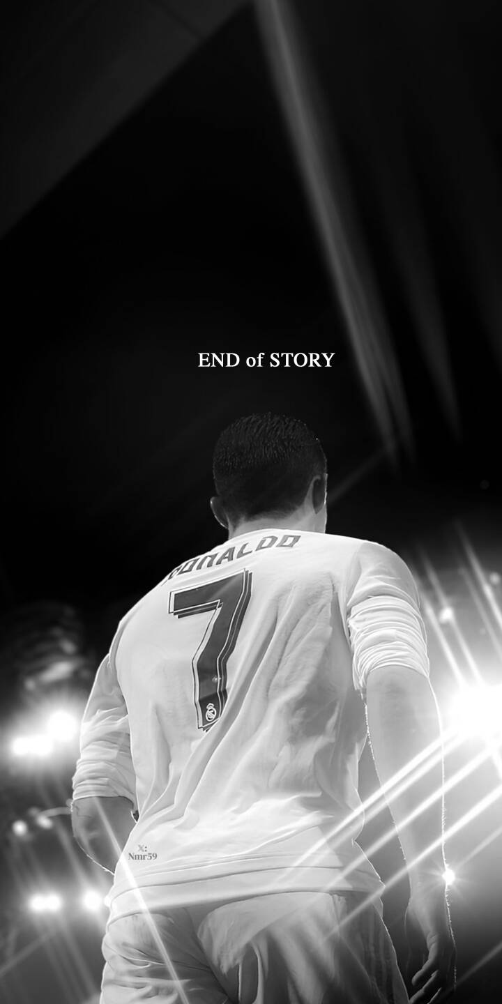 Ronaldo's iconic number 7 Real Madrid jersey glows in stark black and white, framed by dazzling stadium lights in this poignant 4K wallpaper. The powerful "END of STORY" message adds a dramatic touch to this tribute, making it a compelling wallpaper for iPhone. | football iphone real madrid wallpaper cr7 black and white cristiano ronaldo mobile 4k wallpaper hd wallpaper iconic end of story Ronaldo's iconic number 7 Real Madrid jersey glows in stark black and white, framed by dazzling stadium lights in this poignant 4K wallpaper. The powerful "END of STORY" message adds a dramatic touch to this tribute, making it a compelling wallpaper for iPhone.