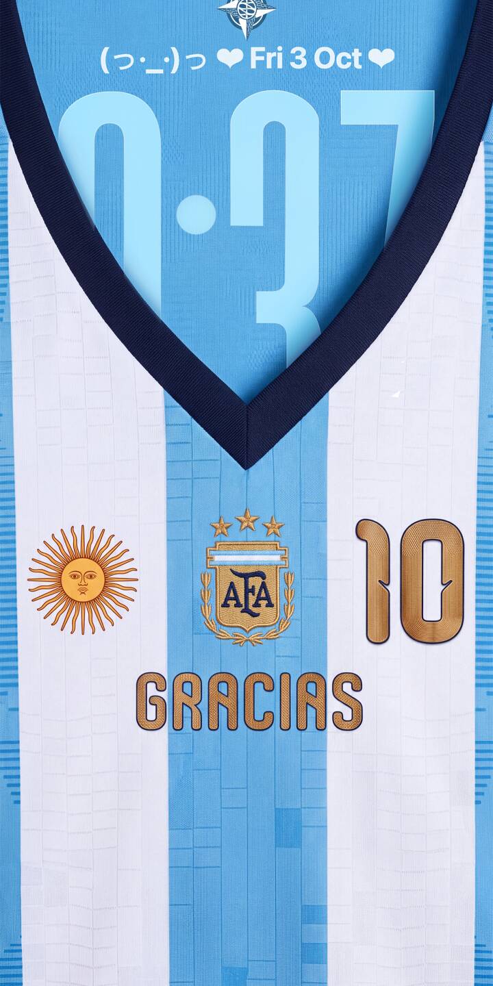 The iconic sky blue and white stripes of the Argentina jersey proudly display the golden Sun of May and the three-starred AFA logo, creating a vibrant 4K wallpaper perfect for any iPhone. This unique wallpaper also features the number 10 and 'GRACIAS' in gold, celebrating football glory. | sports football iphone messi argentina wallpaper jersey mobile 4k wallpaper hd wallpaper number 10 world cup The iconic sky blue and white stripes of the Argentina jersey proudly display the golden Sun of May and the three-starred AFA logo, creating a vibrant 4K wallpaper perfect for any iPhone. This unique wallpaper also features the number 10 and 'GRACIAS' in gold, celebrating football glory.