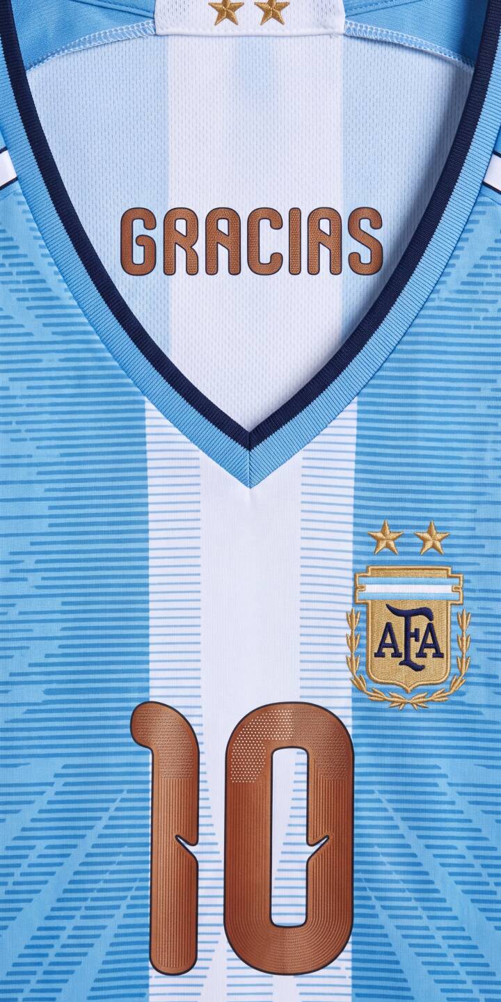 Striking "GRACIAS" text and the iconic number 10 dominate this vibrant Argentina jersey wallpaper, celebrating victory with its classic sky blue and white stripes. This stunning 4K wallpaper for iPhone fans showcases the detailed AFA crest and gold stars, making it a perfect tribute for any football enthusiast. | football iphone messi argentina soccer wallpaper jersey mobile 4k wallpaper hd wallpaper number 10 gracias Striking "GRACIAS" text and the iconic number 10 dominate this vibrant Argentina jersey wallpaper, celebrating victory with its classic sky blue and white stripes. This stunning 4K wallpaper for iPhone fans showcases the detailed AFA crest and gold stars, making it a perfect tribute for any football enthusiast.