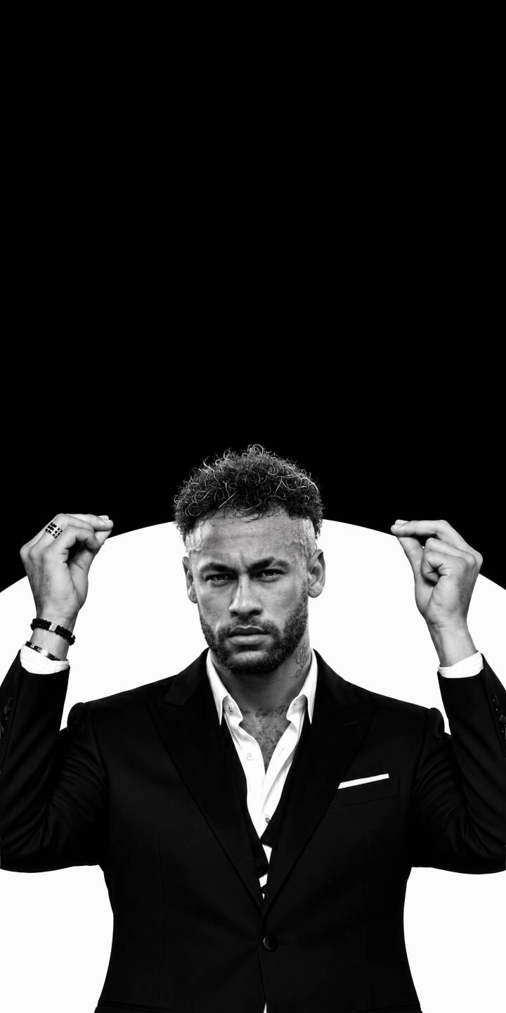 Neymar Jr.'s intense gaze captivates viewers as he strikes a stylish pose in a sharp black suit against a striking minimalist black and white background in this powerful 4K wallpaper; it's the perfect statement wallpaper for iPhone. | portrait suit iphone wallpaper black and white neymar mobile footballer 4k wallpaper hd wallpaper monochrome neymar jr Neymar Jr.'s intense gaze captivates viewers as he strikes a stylish pose in a sharp black suit against a striking minimalist black and white background in this powerful 4K wallpaper; it's the perfect statement wallpaper for iPhone.