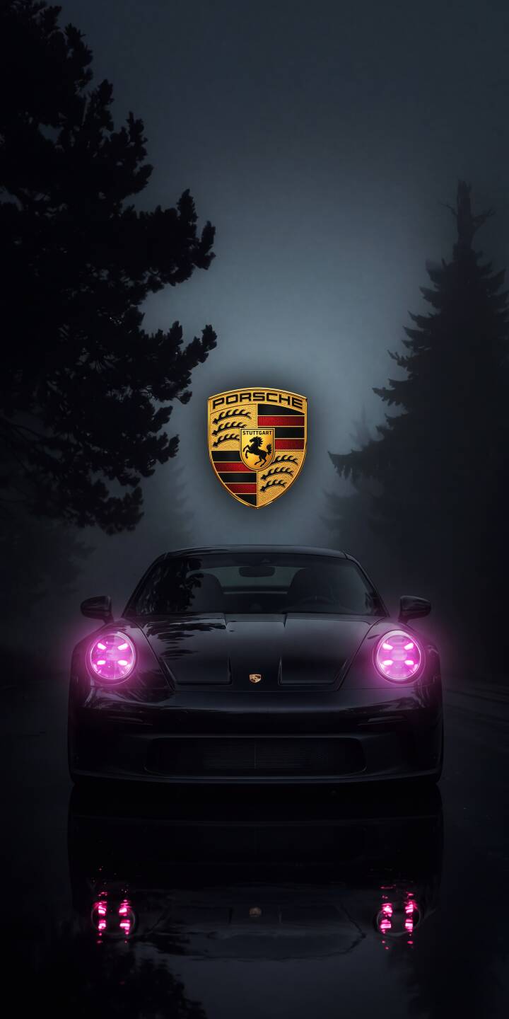 The intense pink glow of a Porsche's headlights pierces through a misty forest night in this sleek 4K wallpaper. This stunning car wallpaper, with its prominent floating Porsche logo and wet road reflection, is perfect for iPhone users seeking a dark and aesthetic backdrop. | sports car neon iphone porsche wallpaper mobile luxury car 4k wallpaper hd wallpaper dark aesthetic pink headlights misty The intense pink glow of a Porsche's headlights pierces through a misty forest night in this sleek 4K wallpaper. This stunning car wallpaper, with its prominent floating Porsche logo and wet road reflection, is perfect for iPhone users seeking a dark and aesthetic backdrop.