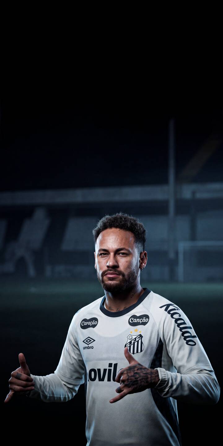 Neymar Jr. showcases his confident stance in the iconic white Santos FC kit, complete with specific sponsor logos and a unique hand gesture in this dynamic 4K wallpaper. This stunning high-resolution wallpaper is a must-have for iPhone fans looking to adorn their screen with the legendary Brazilian footballer. | football dark athlete iphone soccer wallpaper neymar mobile 4k wallpaper hd wallpaper santos neymar jr Neymar Jr. showcases his confident stance in the iconic white Santos FC kit, complete with specific sponsor logos and a unique hand gesture in this dynamic 4K wallpaper. This stunning high-resolution wallpaper is a must-have for iPhone fans looking to adorn their screen with the legendary Brazilian footballer.