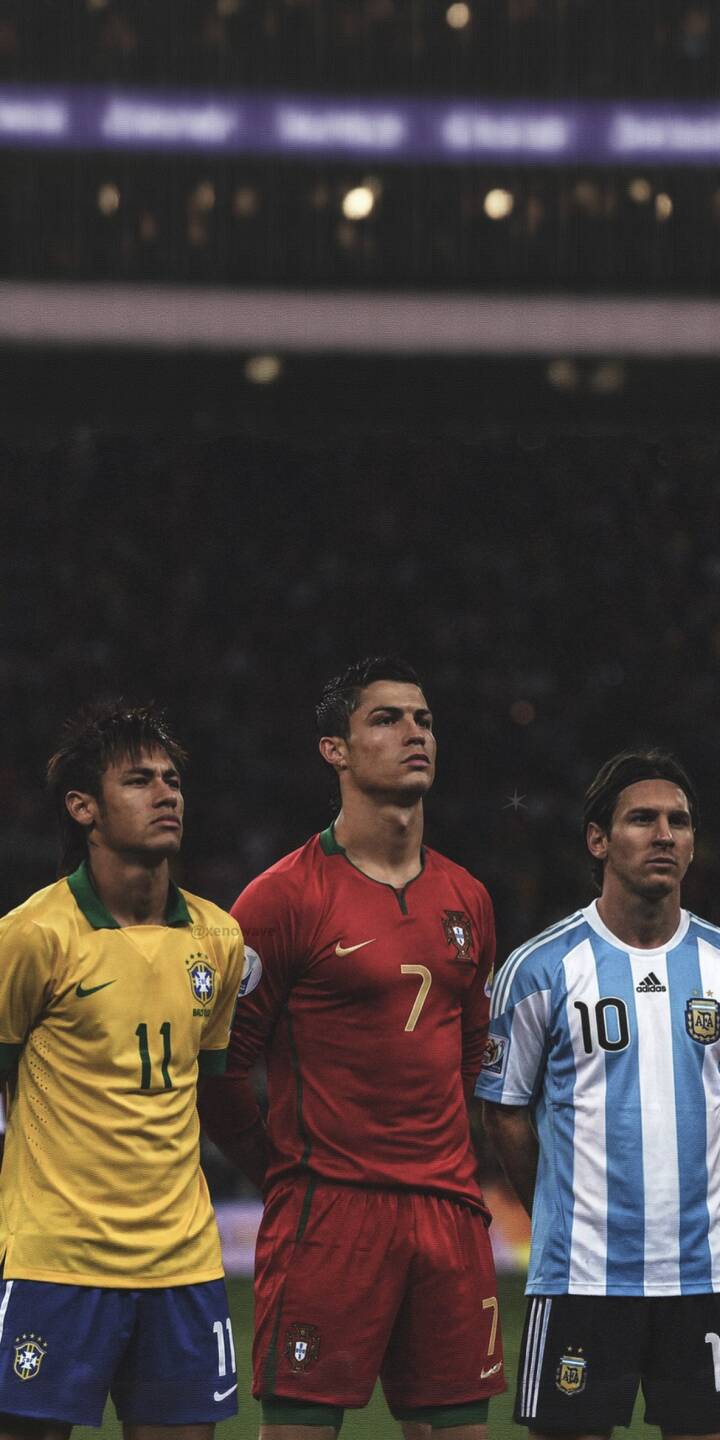 The iconic trio of Neymar, Cristiano Ronaldo, and Lionel Messi stands united and focused in their respective national jerseys (Brazil, Portugal, Argentina) in this powerful 4K wallpaper - an essential football wallpaper for any iPhone user. Their determined gazes and the subtle stadium background create a timeless moment of sports greatness. | football iphone messi soccer wallpaper neymar cristiano ronaldo sport legends mobile 4k wallpaper hd wallpaper The iconic trio of Neymar, Cristiano Ronaldo, and Lionel Messi stands united and focused in their respective national jerseys (Brazil, Portugal, Argentina) in this powerful 4K wallpaper - an essential football wallpaper for any iPhone user. Their determined gazes and the subtle stadium background create a timeless moment of sports greatness.