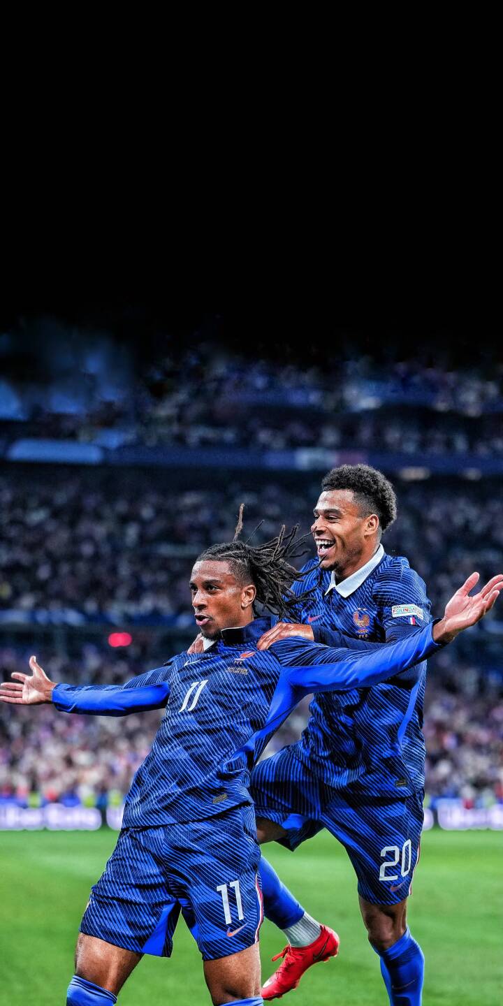 The ecstatic smiles of French football players light up the stadium in this vibrant 4K celebration wallpaper, a perfect wallpaper for iPhone screens capturing the joy of victory. | sports football stadium celebration iphone france soccer wallpaper mobile 4k wallpaper hd wallpaper victory The ecstatic smiles of French football players light up the stadium in this vibrant 4K celebration wallpaper, a perfect wallpaper for iPhone screens capturing the joy of victory.