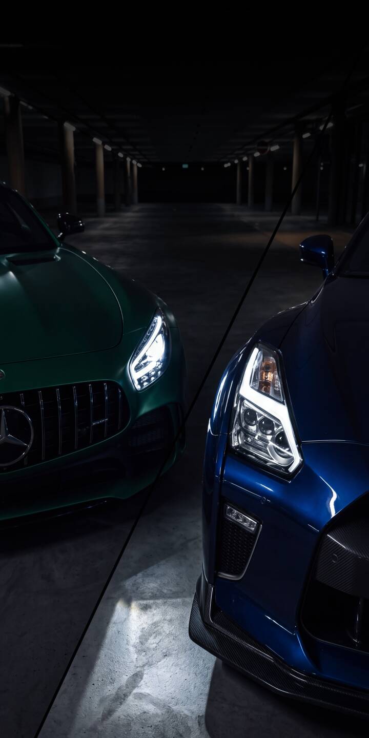 Striking headlights illuminate the dark garage as a green Mercedes-AMG GT R and a blue Nissan GT-R face off in this captivating 4K wallpaper. This dynamic car wallpaper is perfect for your iPhone, showcasing sleek automotive design. | sports car dark iphone nissan mercedes supercar wallpaper mobile headlights 4k wallpaper hd wallpaper gt-r Striking headlights illuminate the dark garage as a green Mercedes-AMG GT R and a blue Nissan GT-R face off in this captivating 4K wallpaper. This dynamic car wallpaper is perfect for your iPhone, showcasing sleek automotive design.