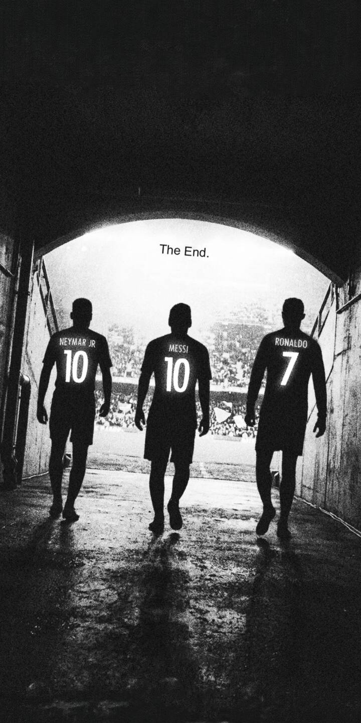 The legendary silhouettes of Neymar Jr, Lionel Messi, and Cristiano Ronaldo emerge from a dark tunnel into the stadium light, marked with "The End." text, creating a profound 4K black and white wallpaper perfect for your iPhone. This evocative wallpaper captures the symbolic farewell of football's greatest trio, offering a powerful and historic image for your device. | football iphone messi ronaldo wallpaper black and white legends mobile 4k wallpaper hd wallpaper iconic neymar jr The legendary silhouettes of Neymar Jr, Lionel Messi, and Cristiano Ronaldo emerge from a dark tunnel into the stadium light, marked with "The End." text, creating a profound 4K black and white wallpaper perfect for your iPhone. This evocative wallpaper captures the symbolic farewell of football's greatest trio, offering a powerful and historic image for your device.